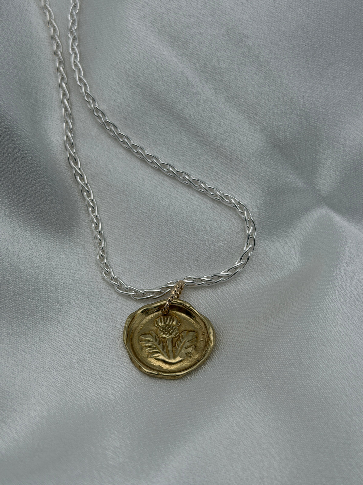 Bronze Thistle on Sterling Wheat