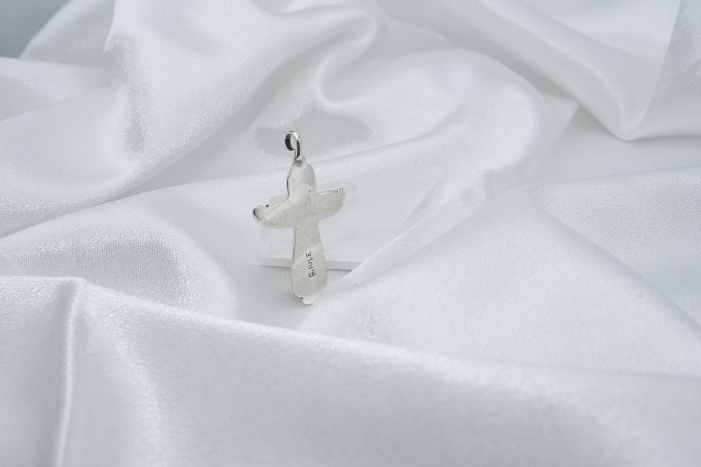 Coral and sterling cross