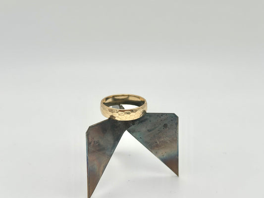 5.5mm thick hammered gold band