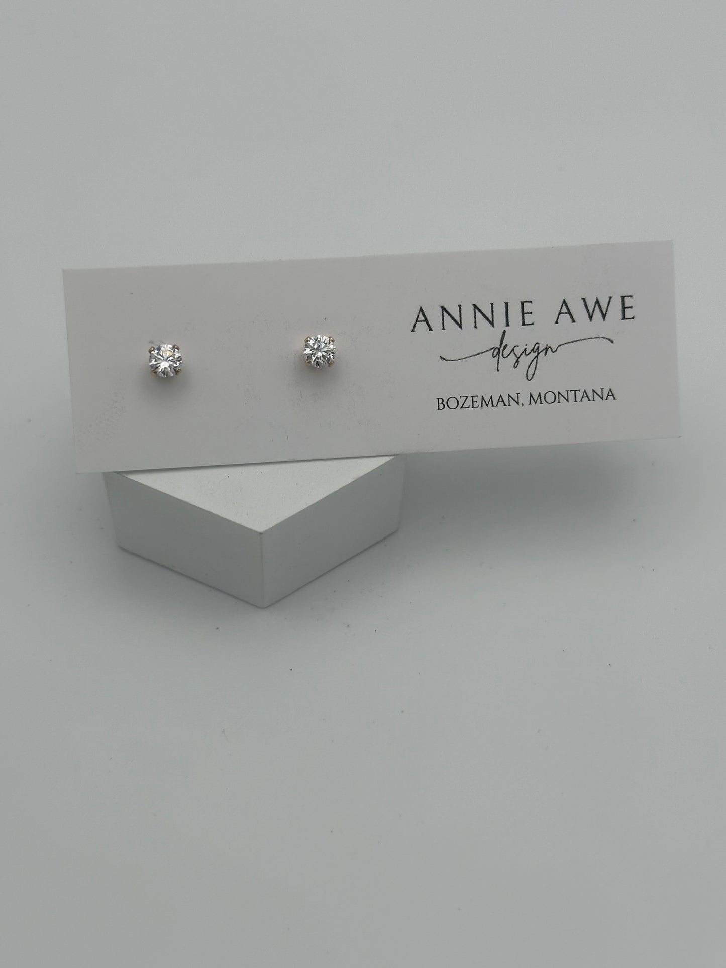 4mm CZ studs in gold