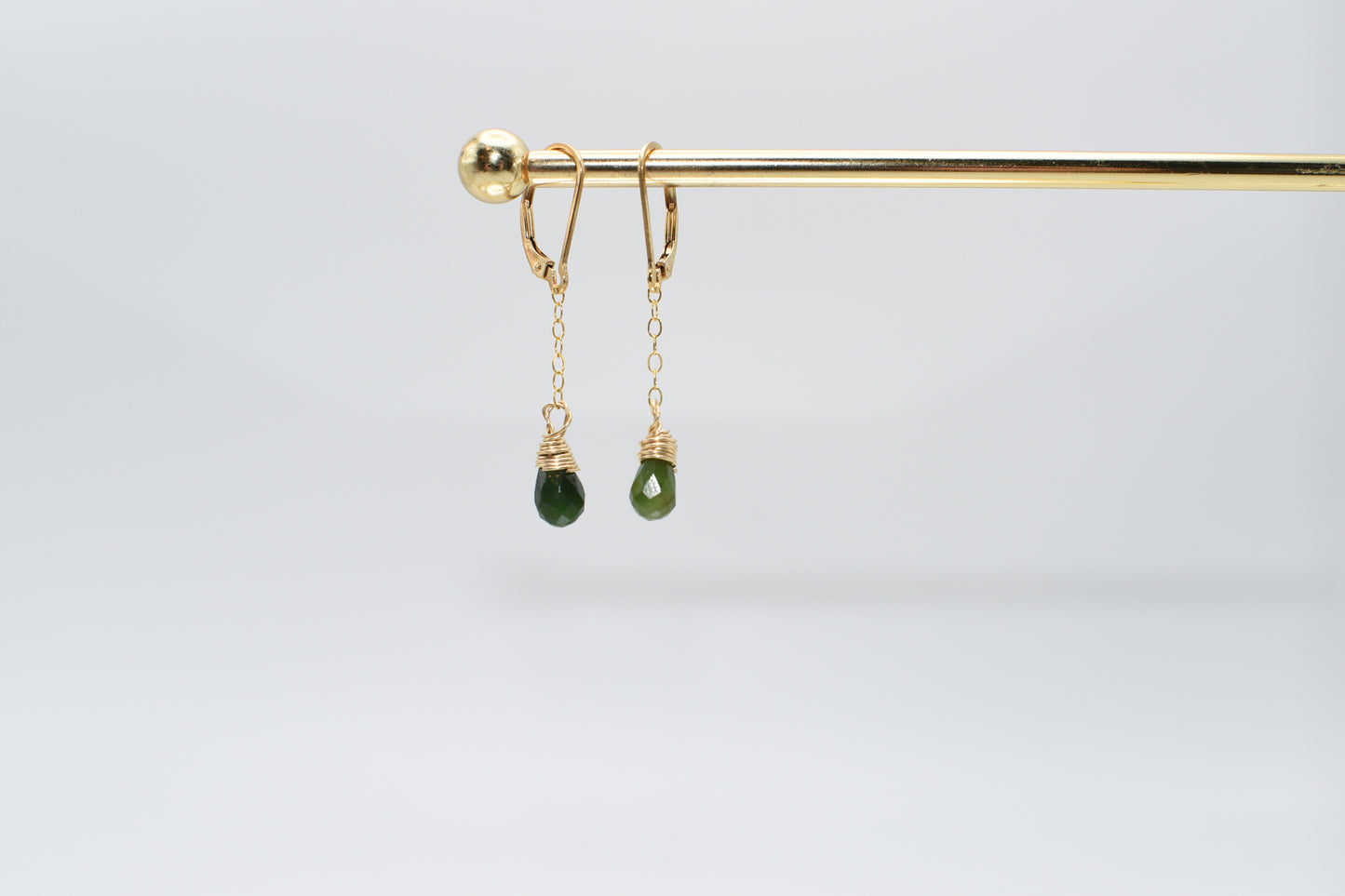 peridot and gold earrings